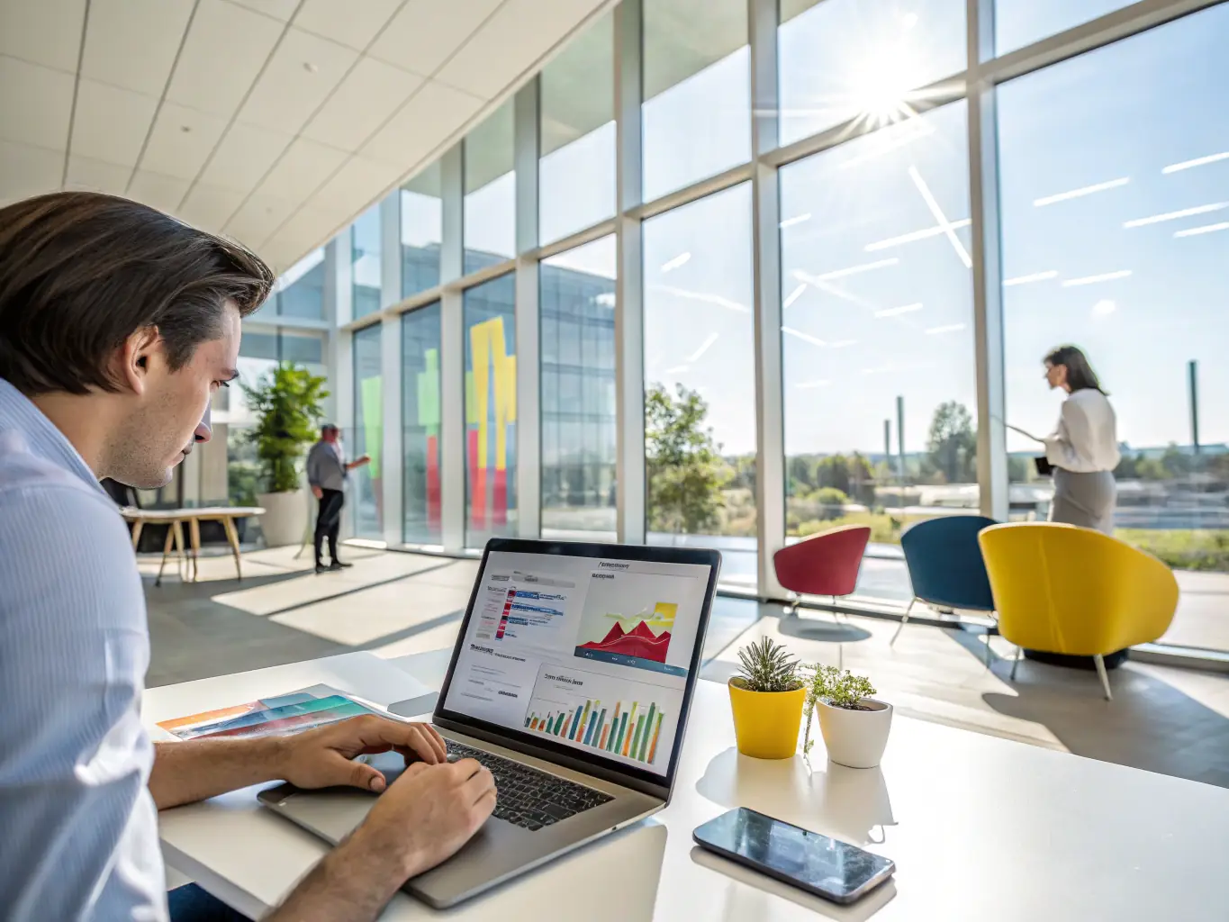 A consultant analyzing VoIP system data on a laptop, with graphs and charts displayed, representing the analysis phase of the consulting process.