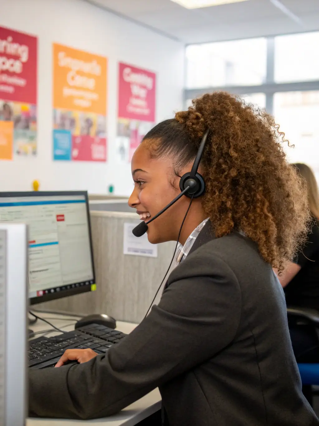A photo of a support team member providing phone support to a client, showcasing the accessibility of phone support.